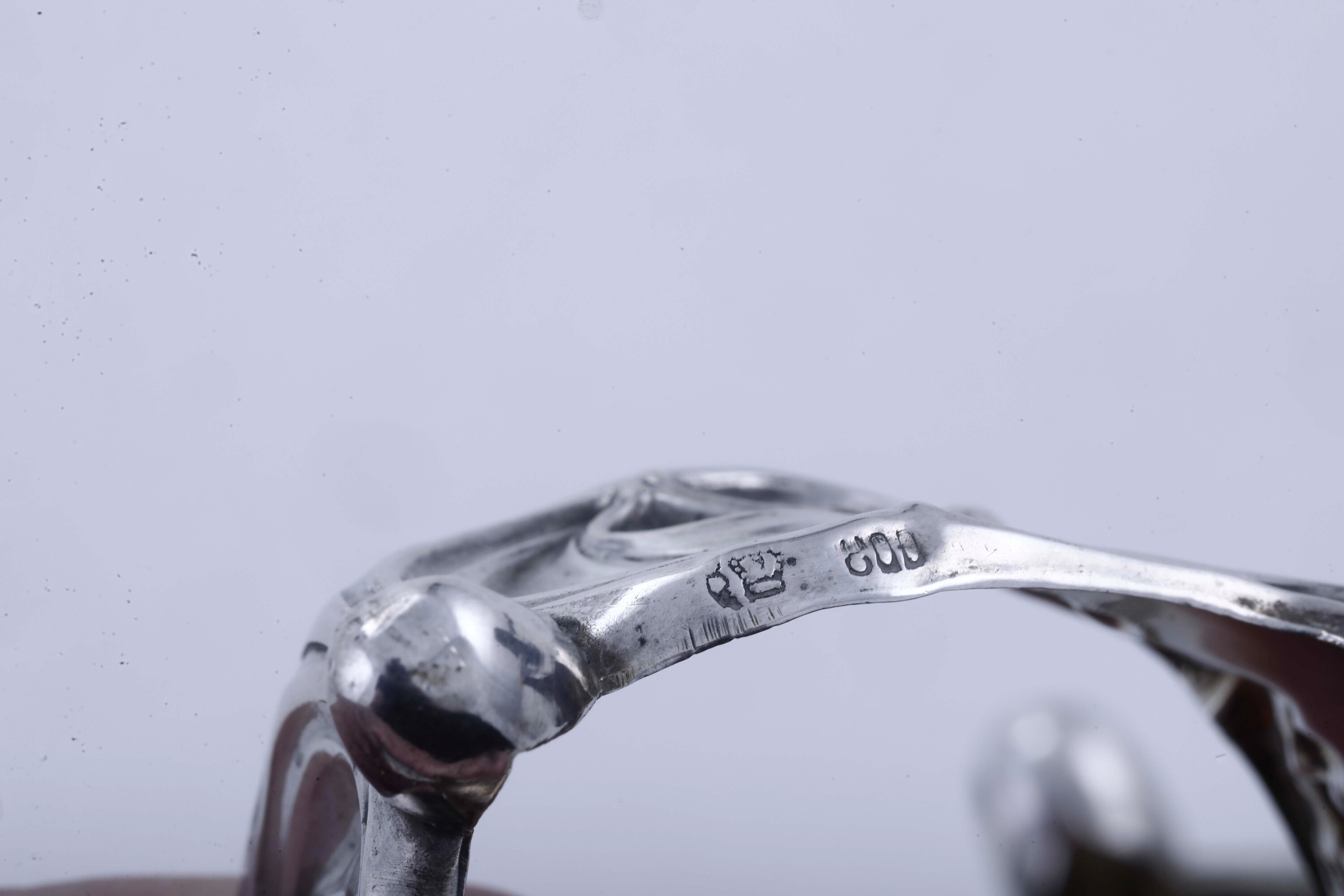 Coppia di saliere, argento fuso e sagomato con inserti in vetro, Germania XX secolo