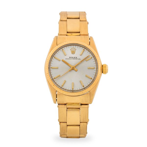 Rolex - Oyster Perpetual ref. 6551 in oro giallo 18k, quadrante argentè Soleil con indici a bastone applicati, circa 1964