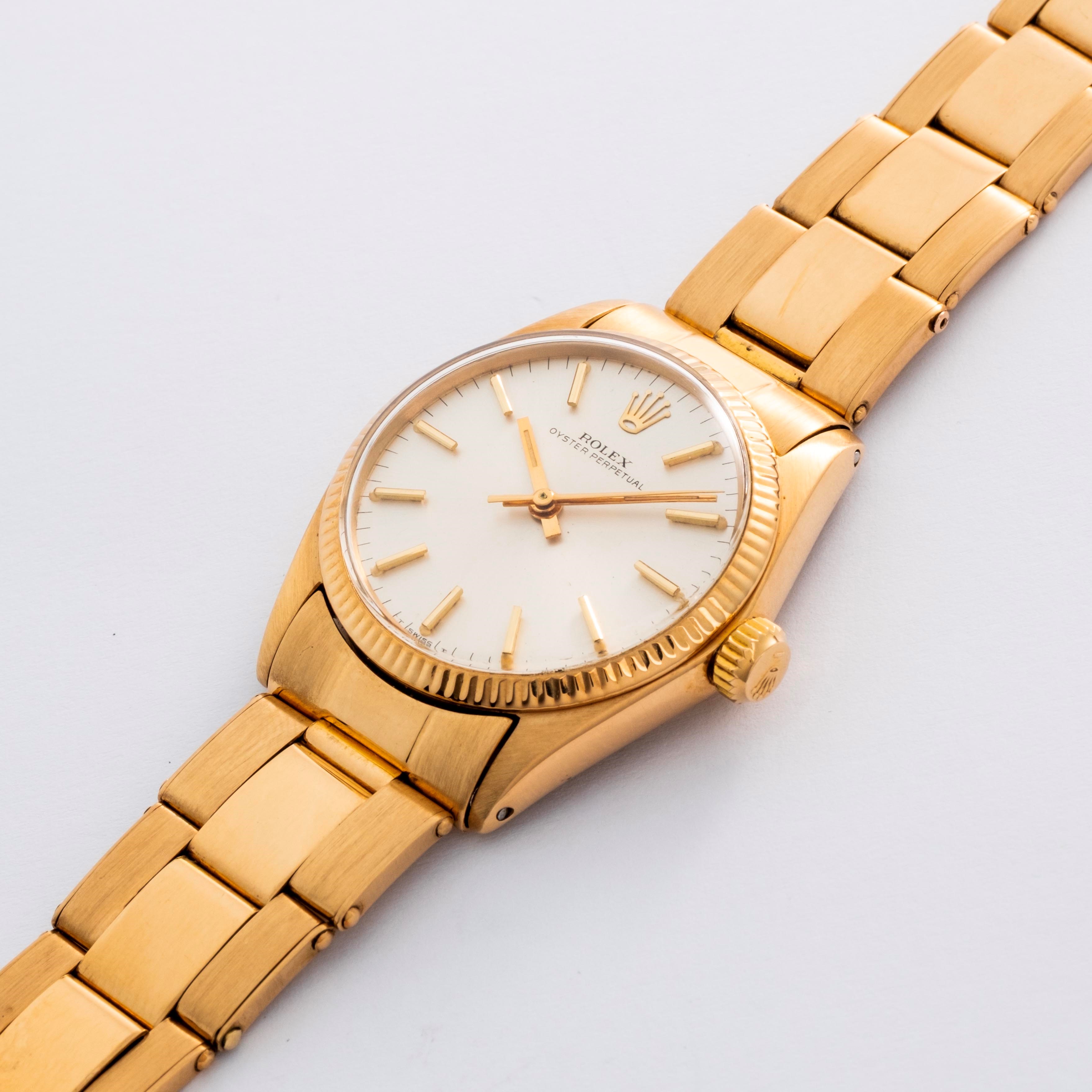 Rolex - Oyster Perpetual ref. 6551 (circa 1964) in oro giallo 18k, quadrante argentè Soleil
