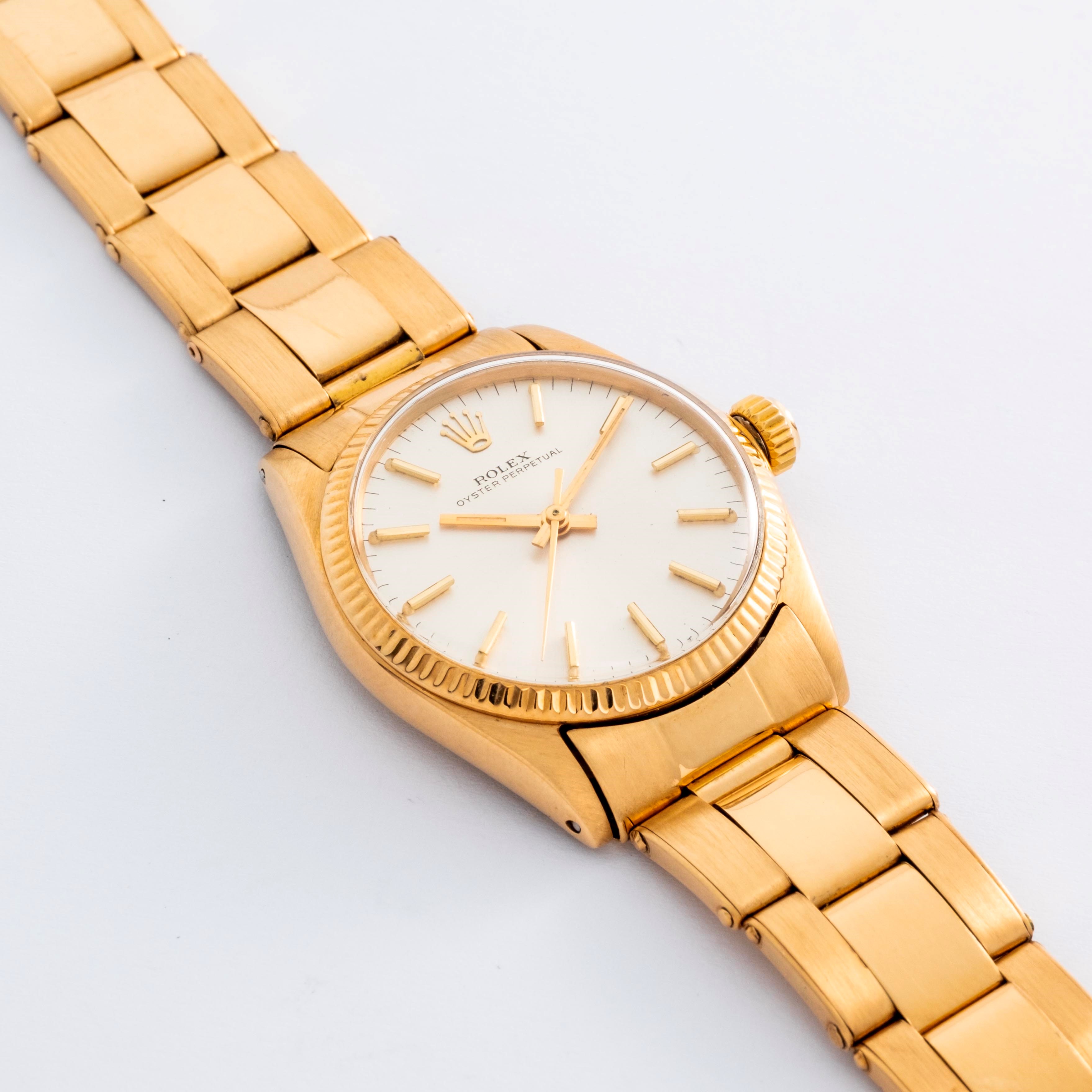 Rolex - Oyster Perpetual ref. 6551 (circa 1964) in oro giallo 18k, quadrante argentè Soleil