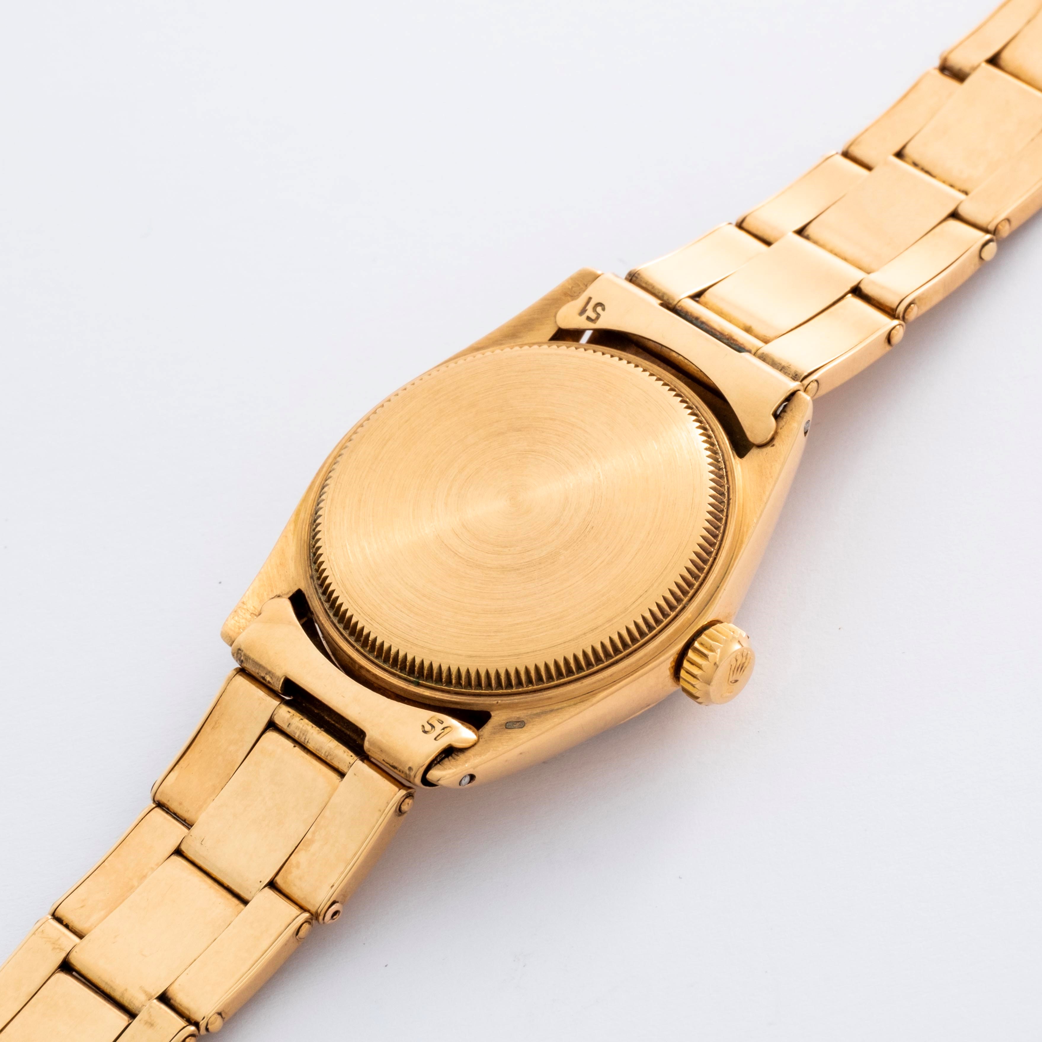 Rolex - Oyster Perpetual ref. 6551 (circa 1964) in oro giallo 18k, quadrante argentè Soleil