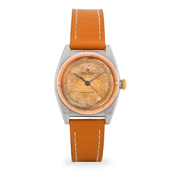 Rolex - Oyster Perpetual Ovetto ref. 3372 in acciaio e oro rosa, quadrante salmone con patina, circa 1954