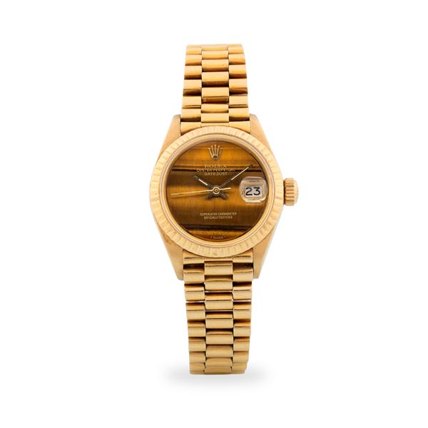 Rolex - Elegante Lady Datejust ref. 6917 in oro giallo 18k, quadrante in pietra "Occhio di tigre", circa 1975