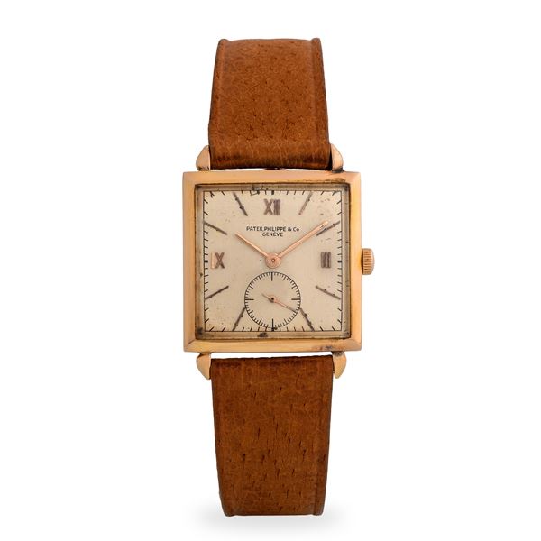 Patek Philippe - Elegante orologio di forma Solo tempo ref. 1432 in oro rosa 18k, quadrante argentè con numeri Romani applicati e piccoli secondi al sei, circa 1940