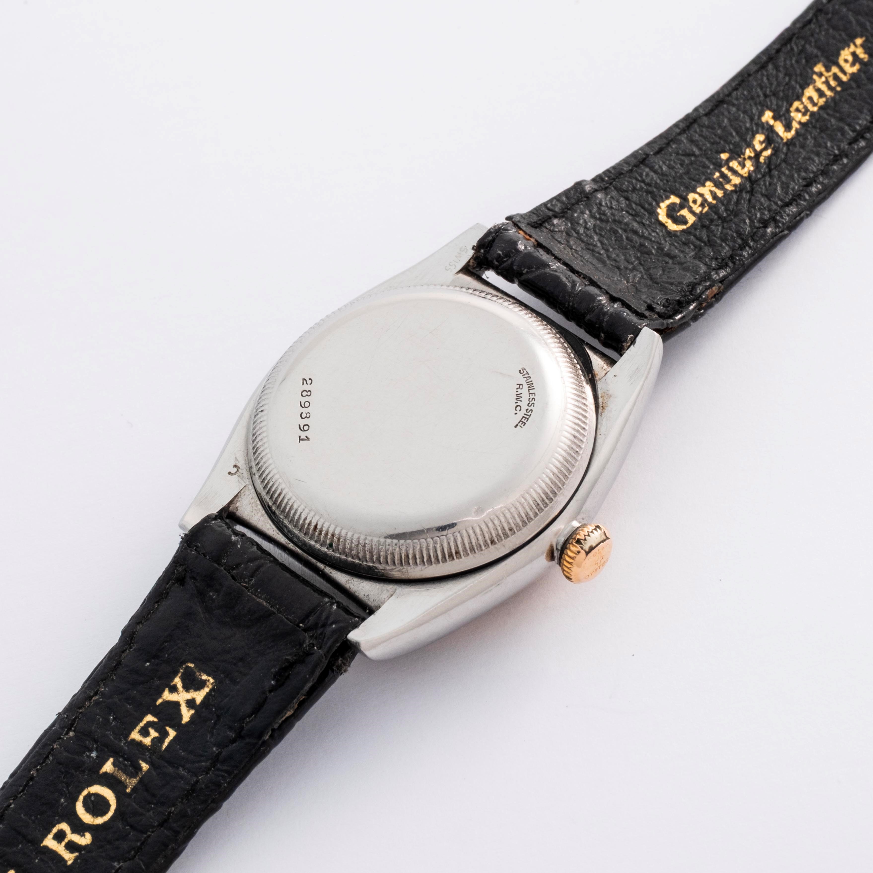 Rolex - Oyster Perpetual Ovetto ref. 3133, acciaio e oro giallo 18k, quadrante nero “California”,...