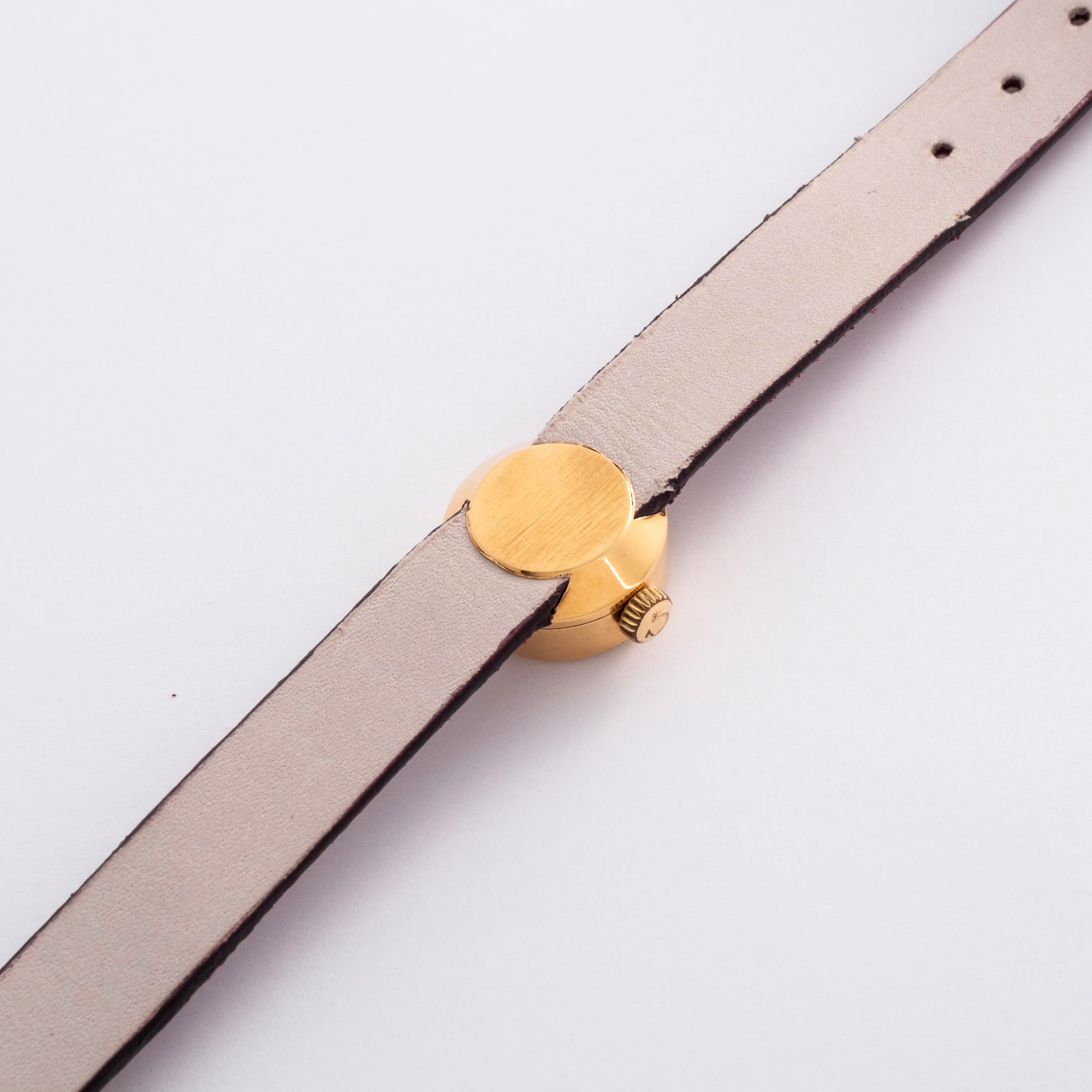 Rolex - Orchid ref. 9674 in oro giallo 18k, quadrante argentè Soleil, circa 1950