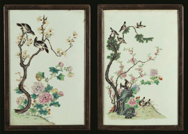Pair of famille rose porcelain plaques depicting naturalistic motifs of flowering branches and birds, China, Qing Dynasty, 18th century.