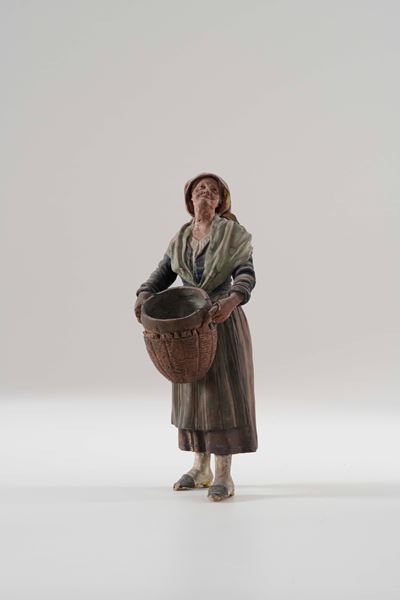 Statuetta da presepe, Contadina con cesto, terracotta policroma (XX secolo)