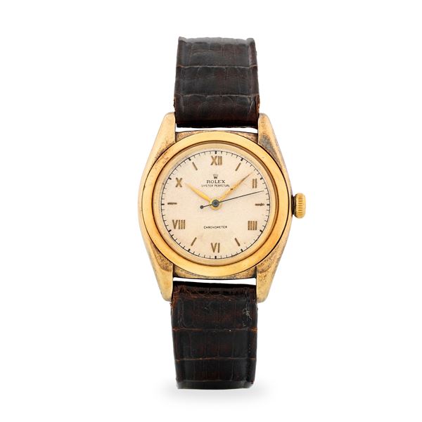 Rolex - Oyster Perpetual Ovetto ref. 3131 in oro giallo 14k, quadrante argentè con numeri Romani e lancette a foglia, circa 1946