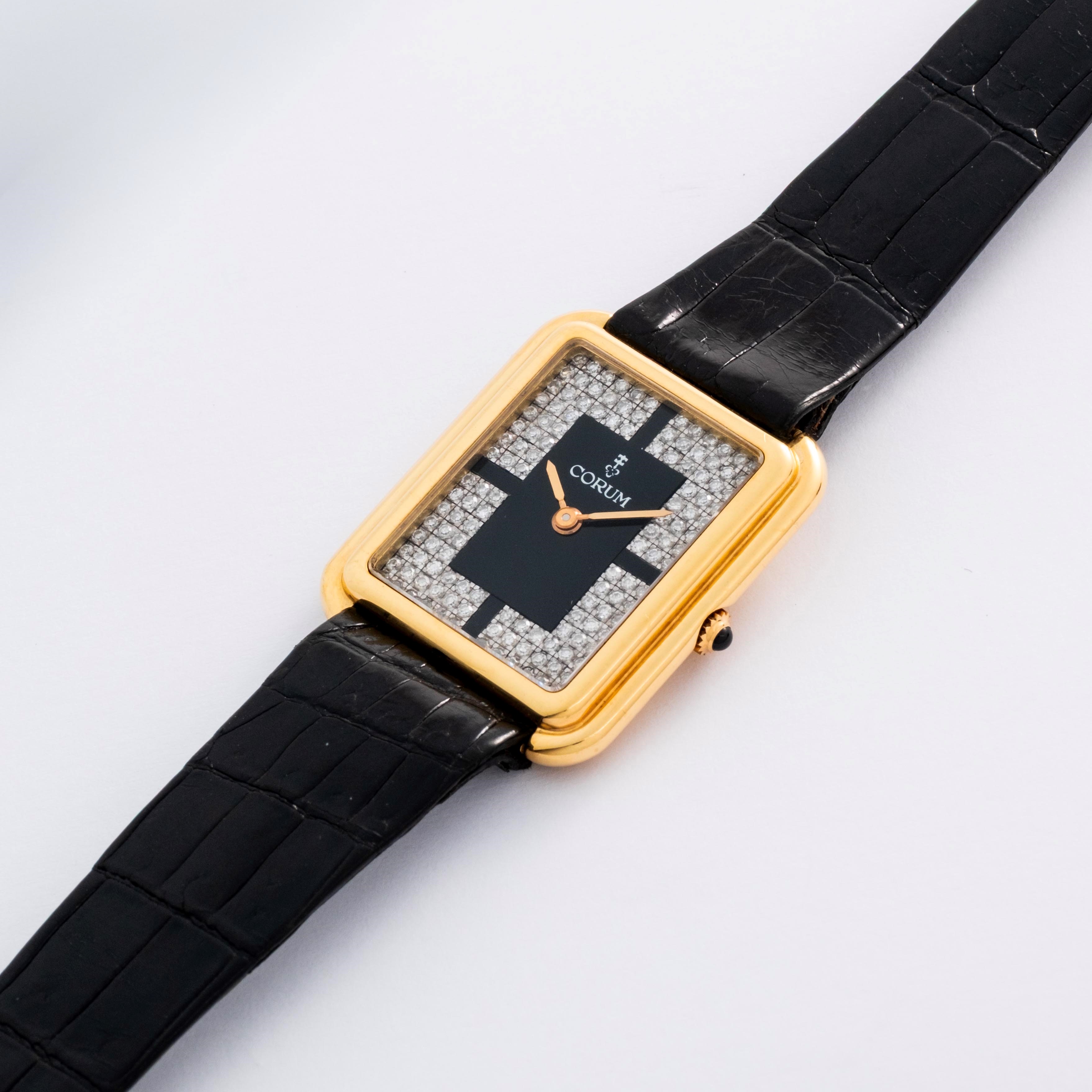 Corum - Tank ref. 27218 in oro giallo 18k con quadrante nero e pavé di diamanti (circa 1980)