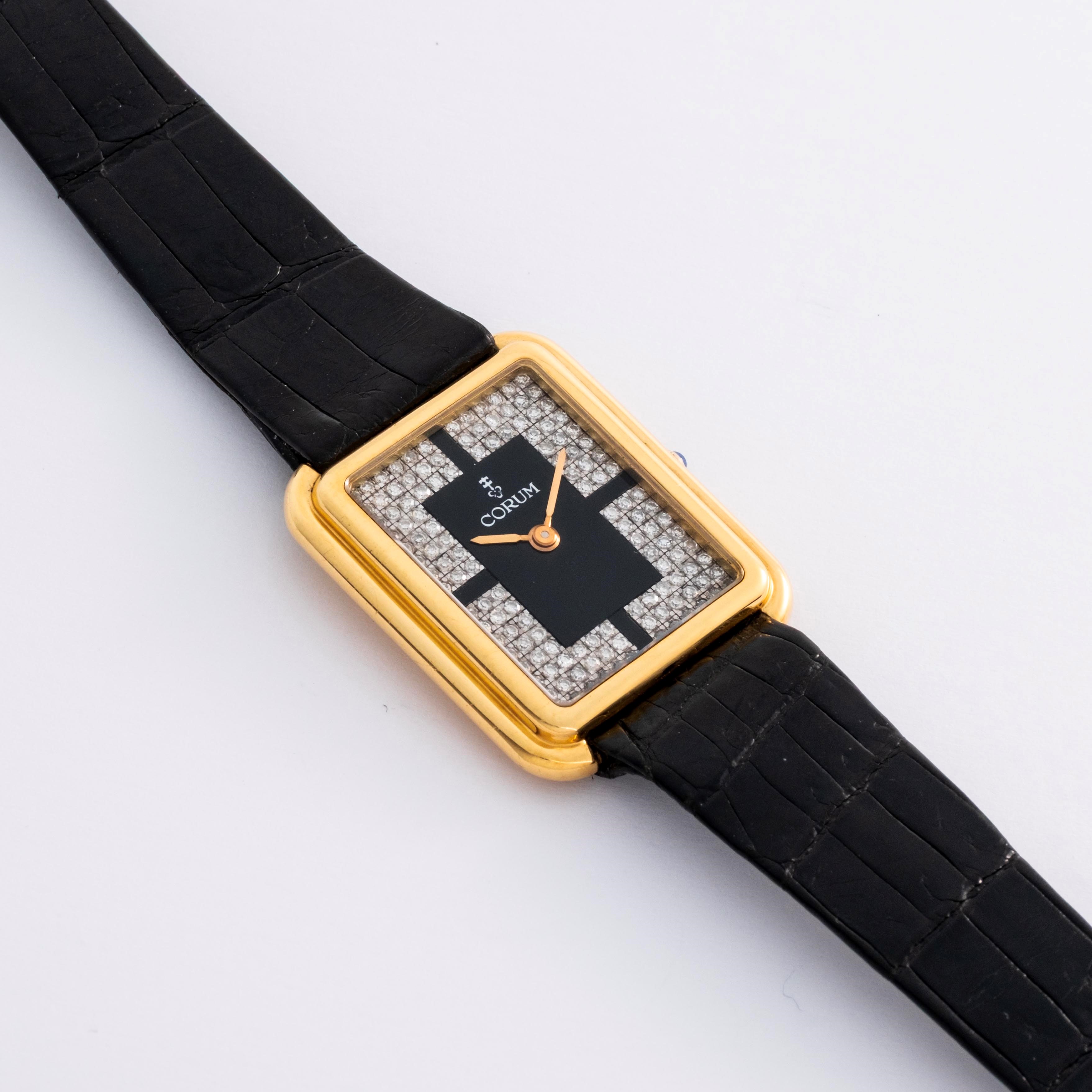 Corum - Tank ref. 27218 in oro giallo 18k con quadrante nero e pavé di diamanti (circa 1980)