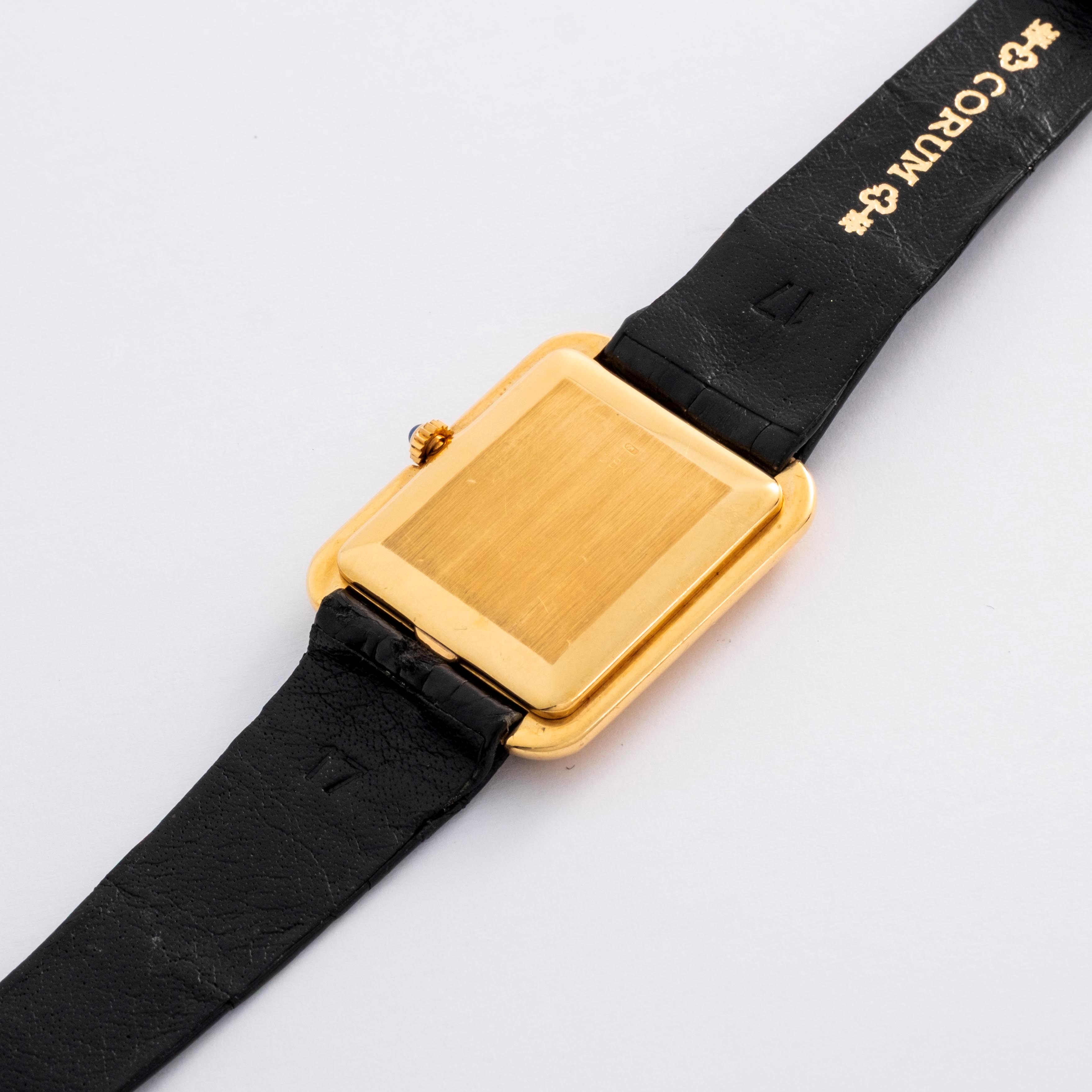 Corum - Tank ref. 27218 in oro giallo 18k con quadrante nero e pavé di diamanti (circa 1980)