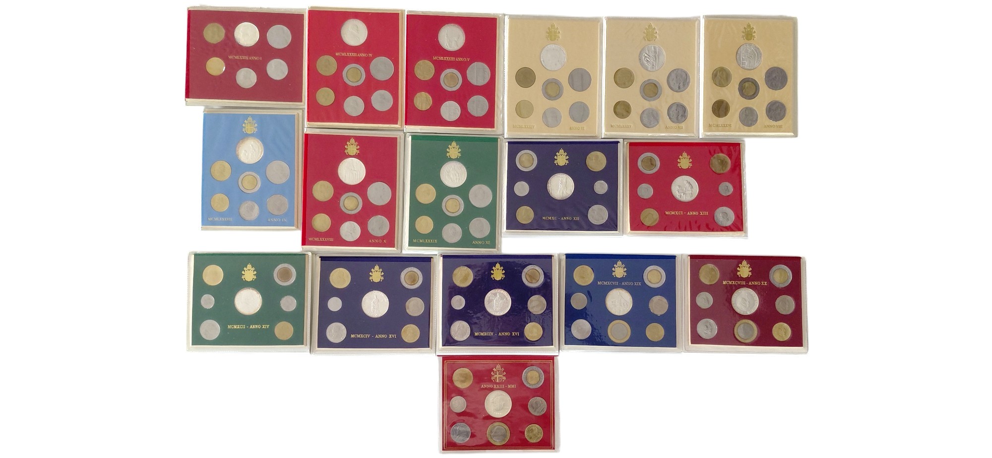 Vaticano, 1979-2001. Divisionali di franchi FdC con monete in argento (835 ‰) da 500 e 1000 Lire