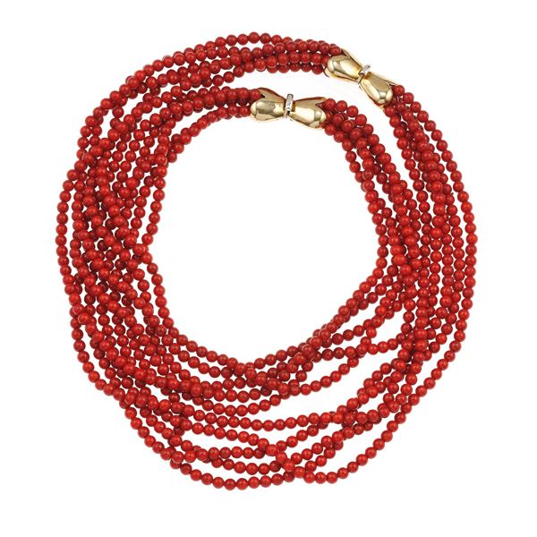 Bamboo coral and gold sautoir. Convertible into two necklaces