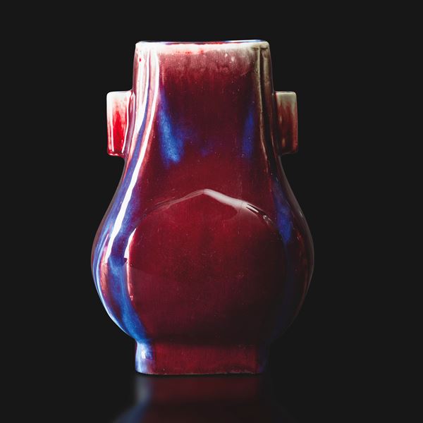 Flambé porcelain Hu vase in shades of red and purple, China, Qing Dynasty, 19th century.