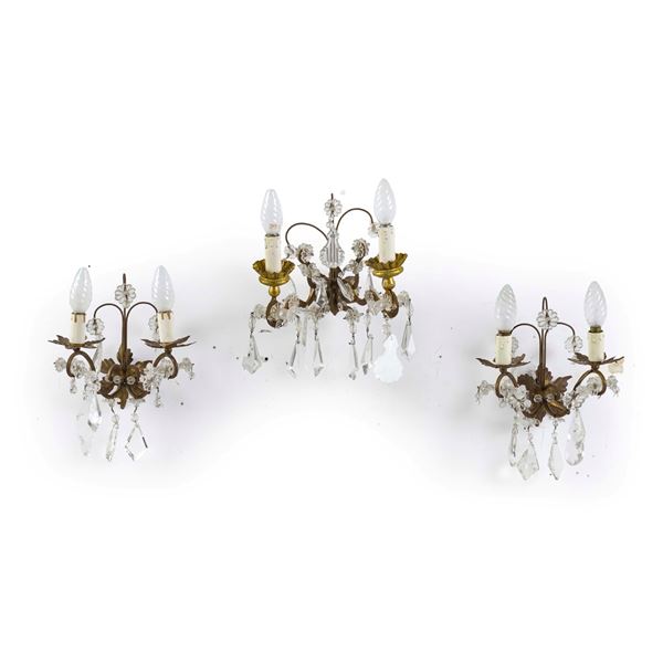 Tre appliques in metallo e cristalli. XX secolo
