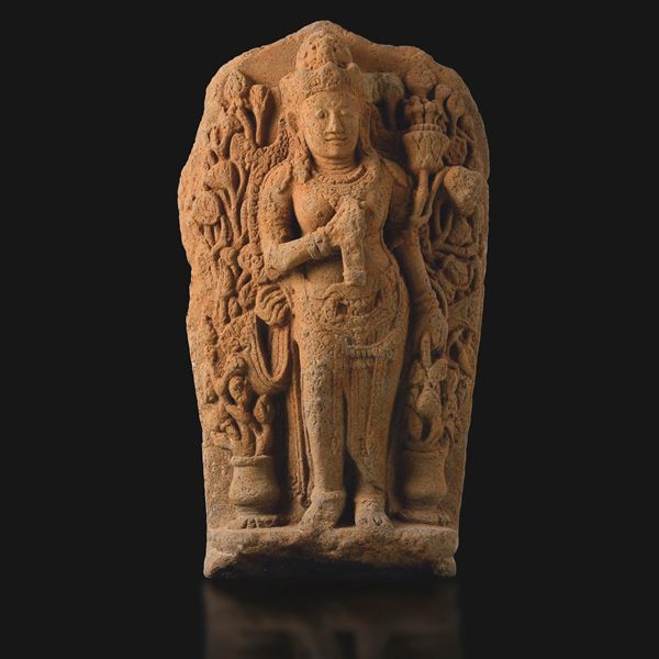 Important stone Buddha figure in volcanic stone, Java, 10th century.