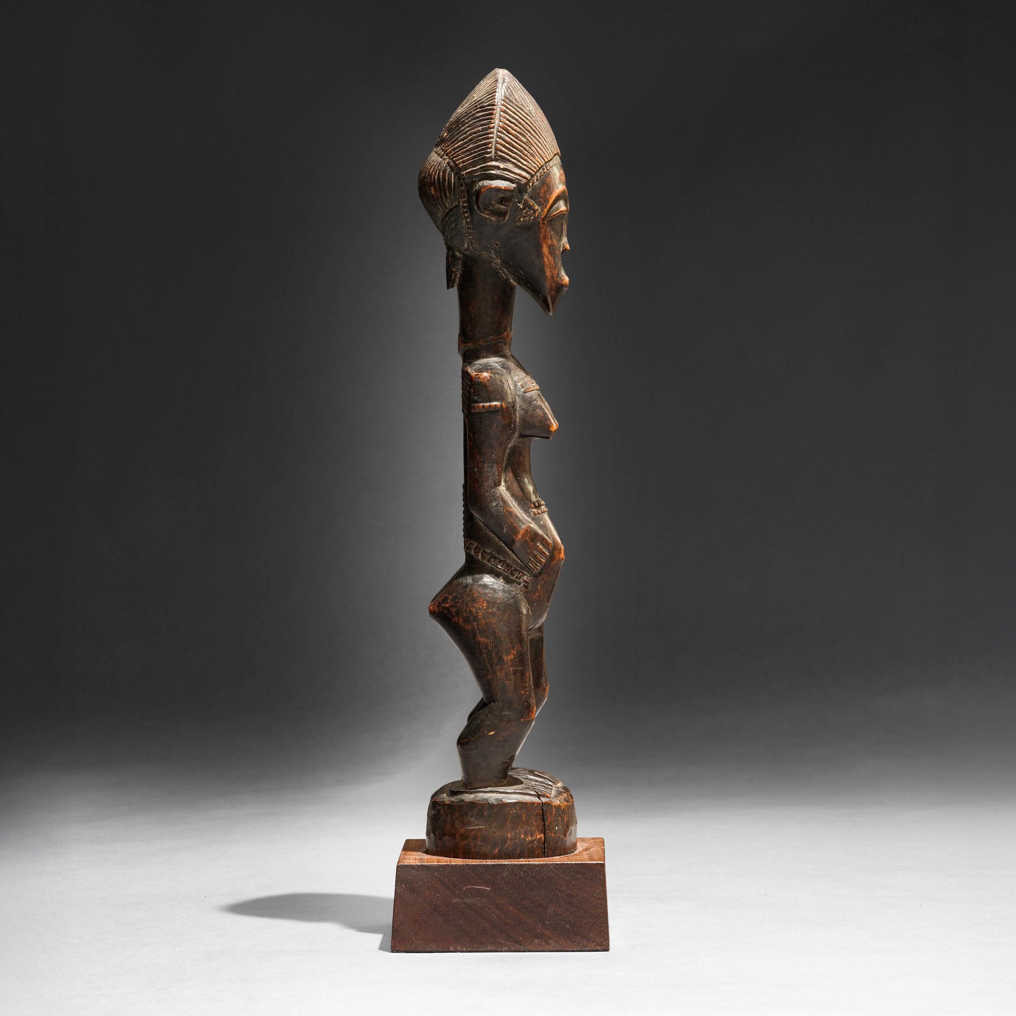 Baoulé, Statua in legno a patina scura (Costa d’Avorio), inizio XX secolo