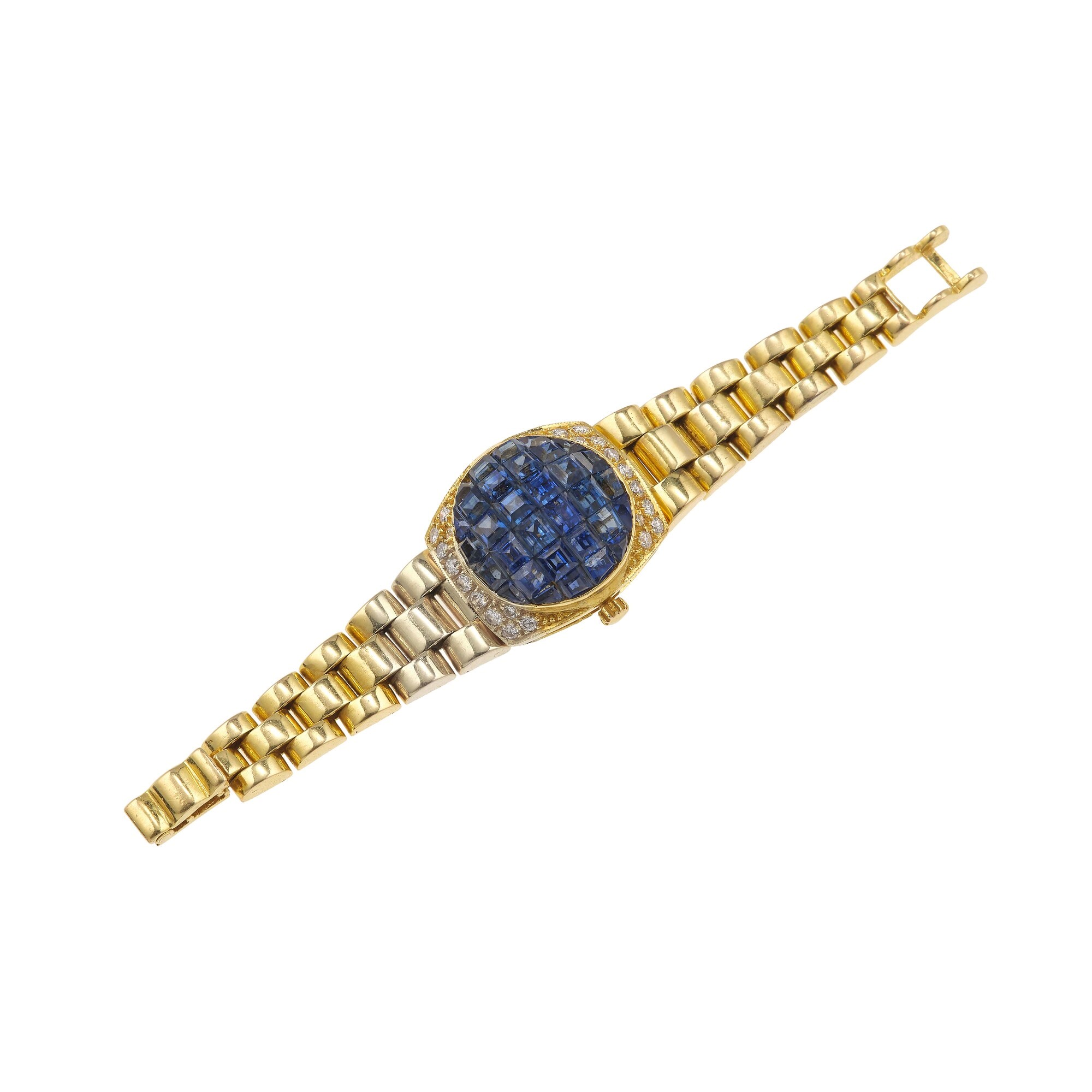 Anello “orologio”, montatura in oro giallo 750/1000, con zaffiri e diamanti