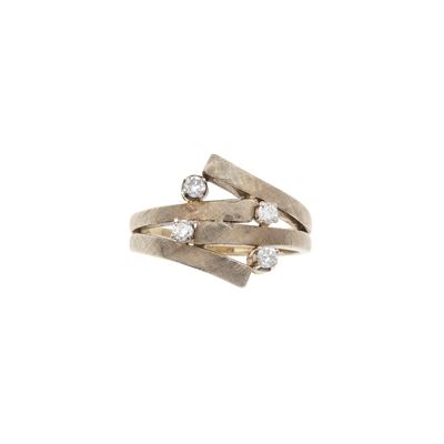 Anello in oro bianco 750/1000 con quattro piccoli diamanti