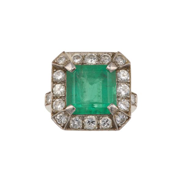 Emerald, diamond and gold ring