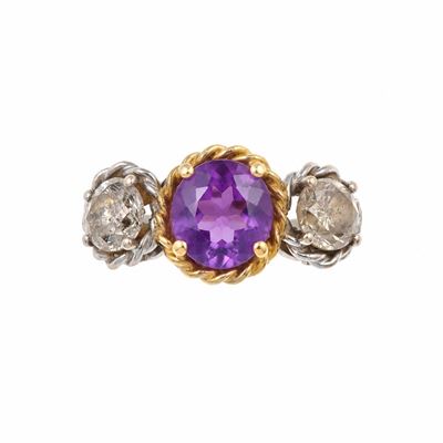 Anello con ametista e diamanti, montatura in oro bianco 750/1000