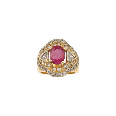 Anello con rubino trattato e diamanti, montatura in oro giallo e oro bianco 750/1000