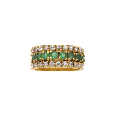 Anello in oro giallo 750/1000 con diamanti e smeraldi a fascia