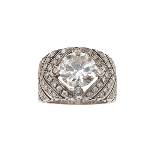 Anello a fascia con diamante taglio brillante di ct 4.30 circa