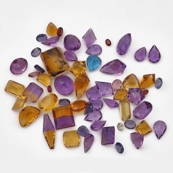 Collection of unmounted multicolored quartz, of various shapes and treatments, with a total weight of approximately 375.00 carats