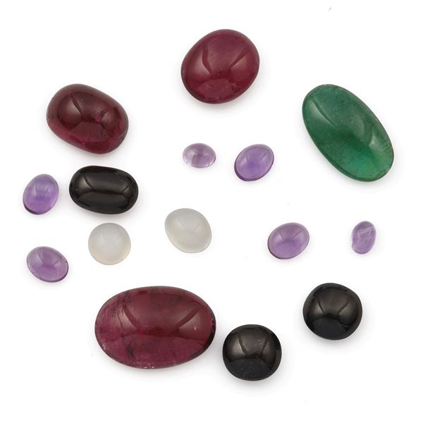 Collection of unmounted multicolored gemstones, of various shapes and treatments, with a total weight of approximately 128.00 carats