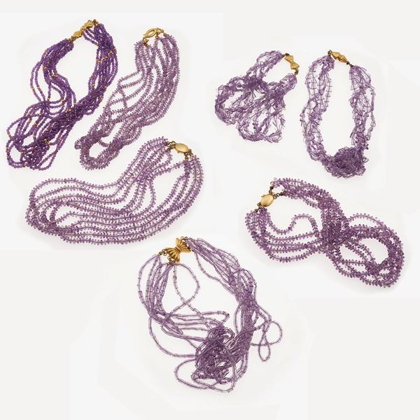 Seven amethyst and gold necklaces
