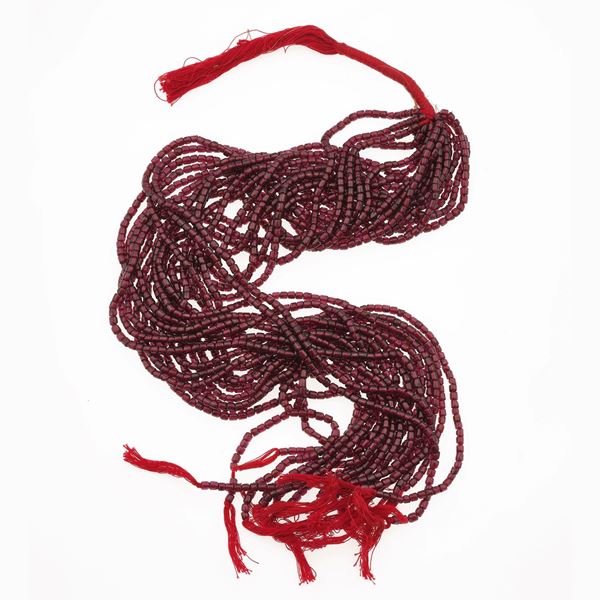 Twenty strands of garnets