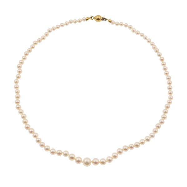 Cultured pearl and gold necklace