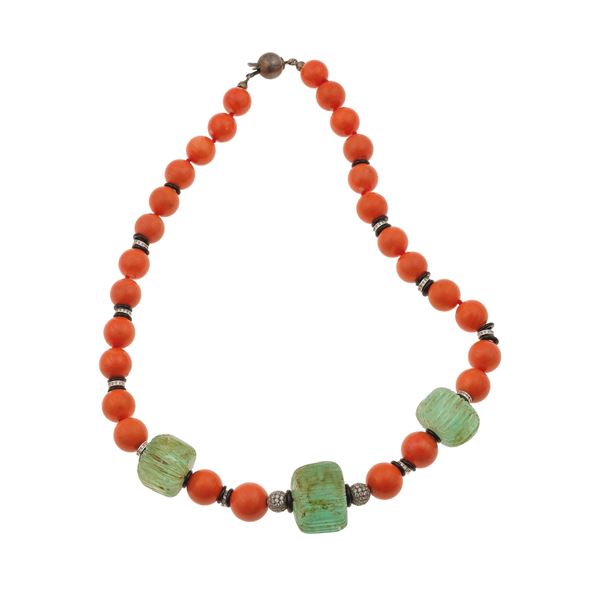 Coral, emerald, diamond, onyx, silver and gold necklace