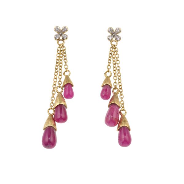 Pair of ruby, diamond and gold earrings