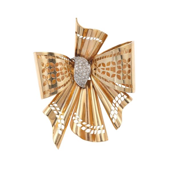 Diamond and low-karat gold bow brooch. Damages