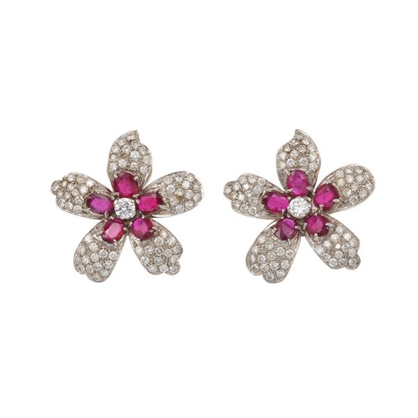 Pair od ruby, diamond and gold earrings. One missing diamond