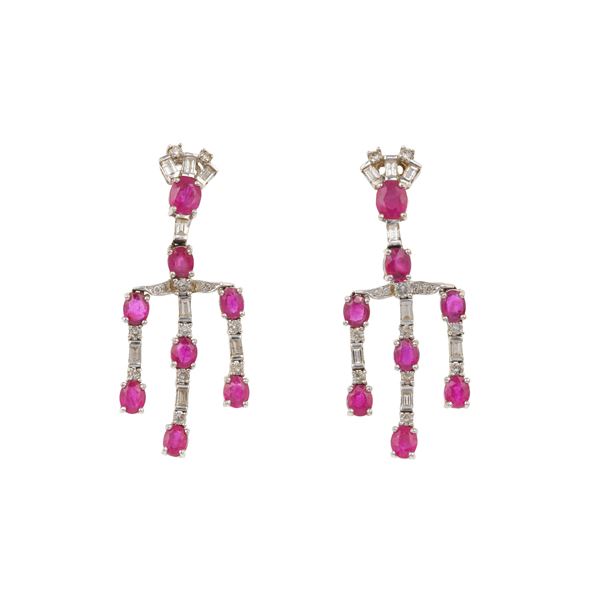 Pair of tratment ruby, diamond and gold earrings
