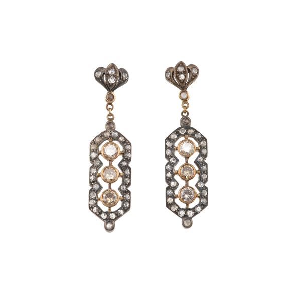 Pair of diamond, gold and silver earrings