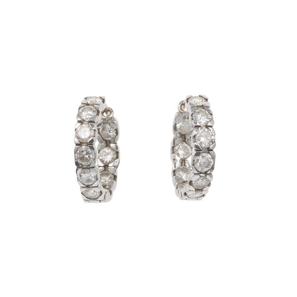 Pair of fiamond and gold earrings