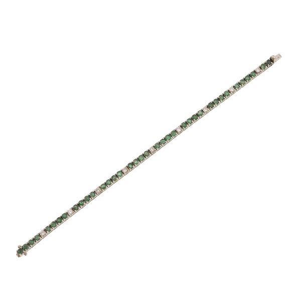Emerald, diamond and gold line bracelet