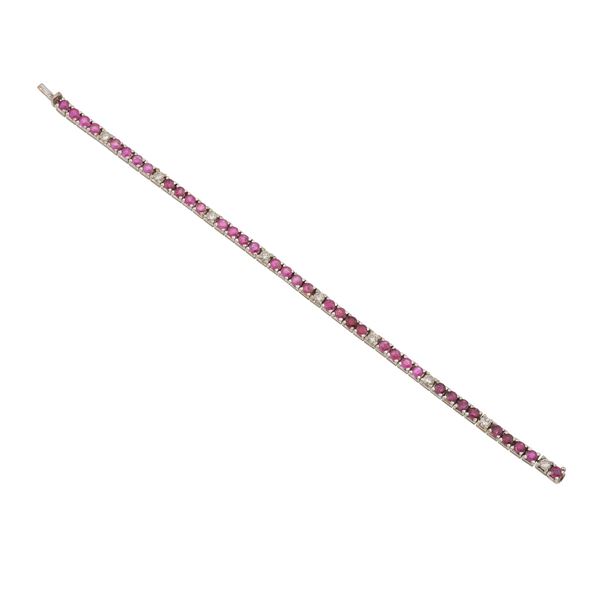Bracciale tennis con rubini e diamanti