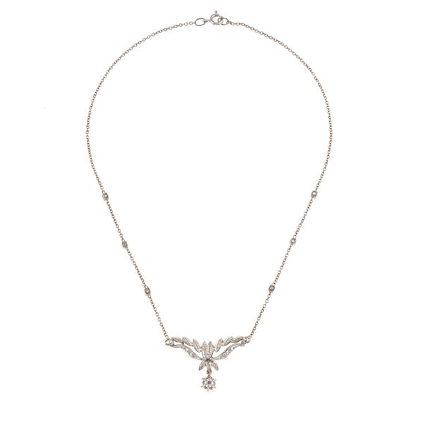 Diamond and gold pendant necklace