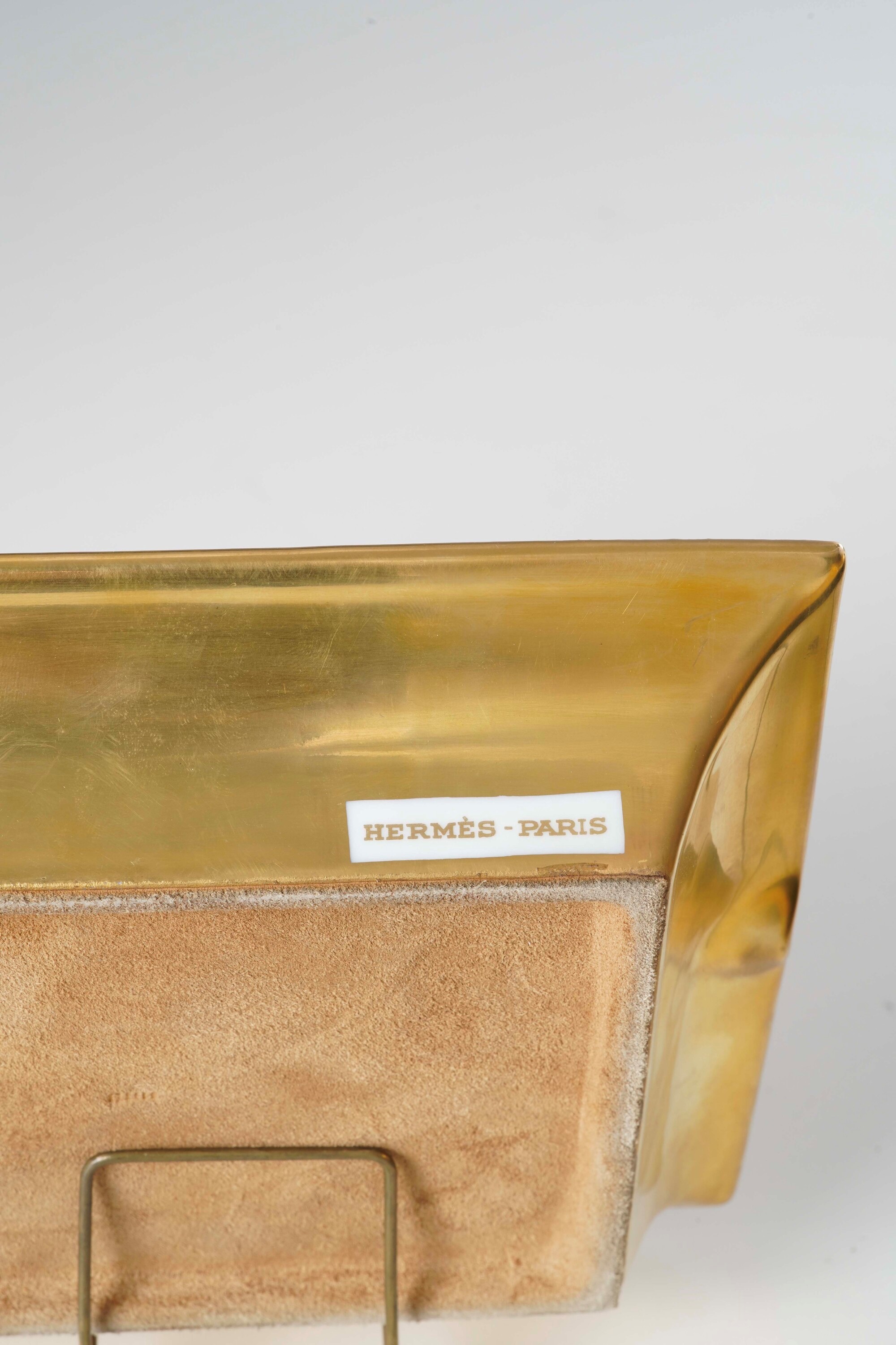 Hermès, Quattro posacenere in porcellana decorati con animali, figure orientali e motivi floreali