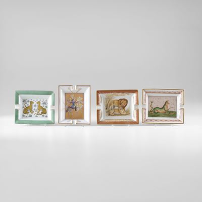 Hermès, Quattro posacenere in porcellana con raffigurazioni di animali e figure