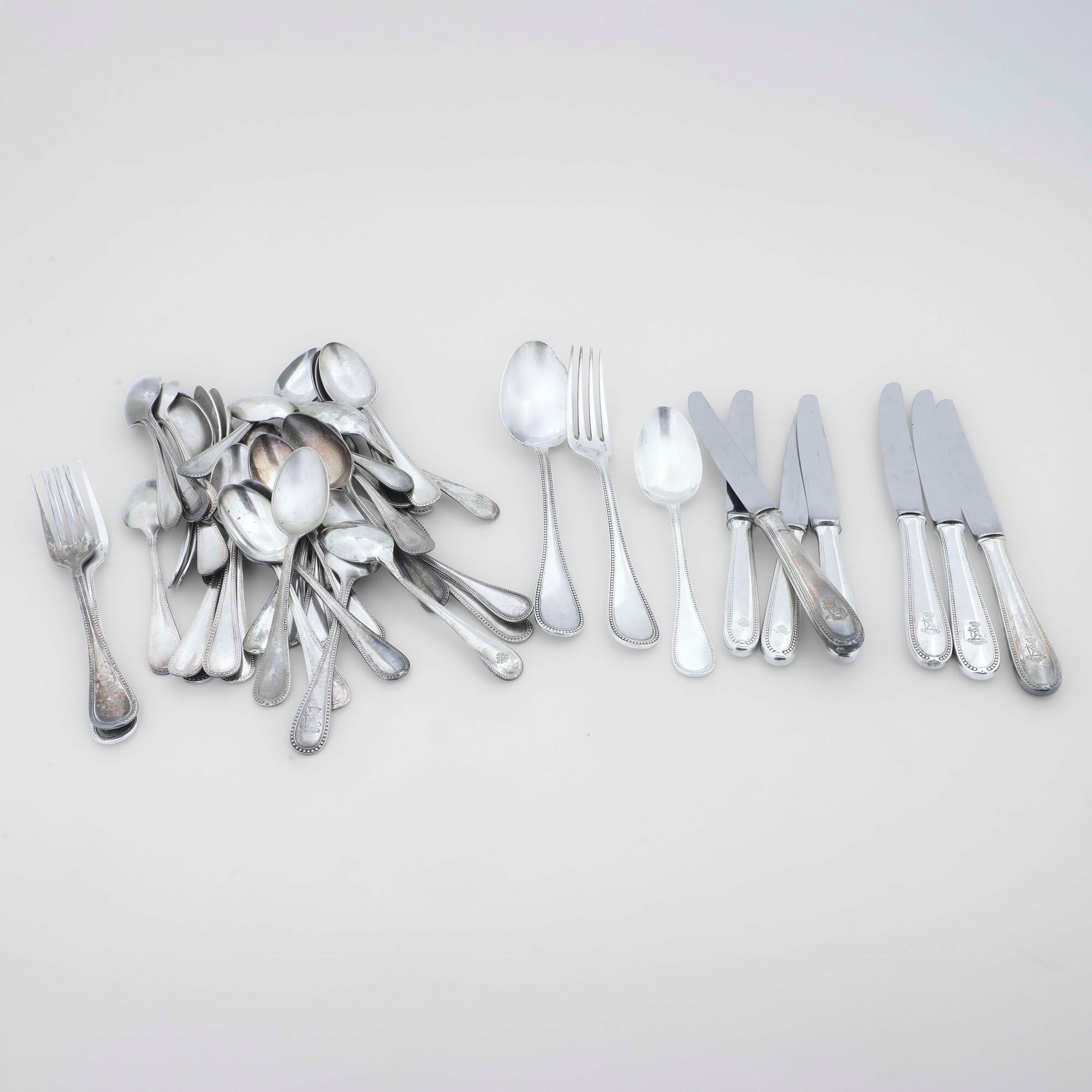 Metallo argentato e argento, Servizio di posateria (XX secolo)