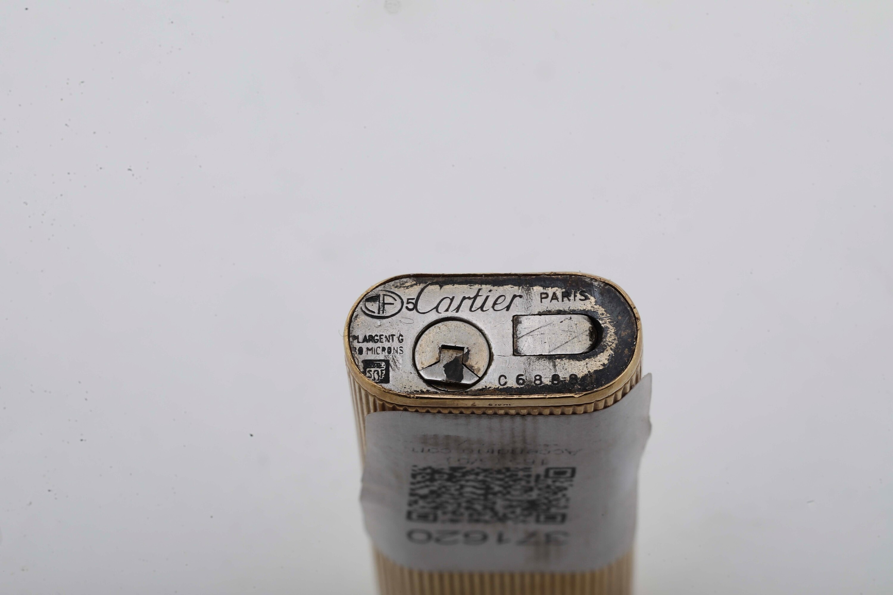 Cartier, Accendino con rivestimento in oro 750