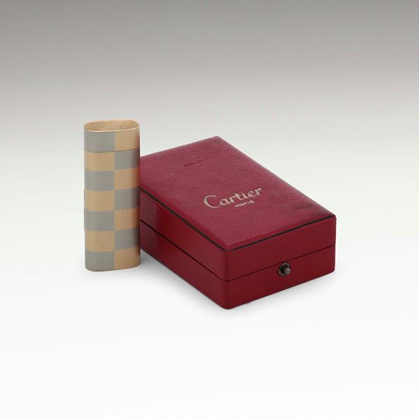 Cartier. Accendino in metallo placcato in oro
