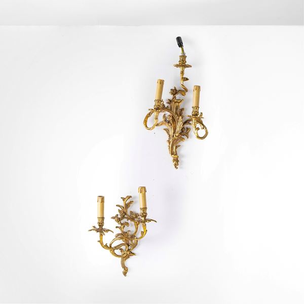 Due diverse applique rocaille. XX secolo